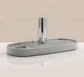 Silicone faucet splash guard mat with auto-drain and a soap slot for the kitchen sink