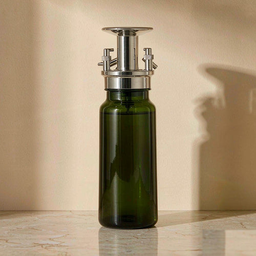 Dark green glass 2-in-1 olive oil dispenser with a spray nozzle and pour spout