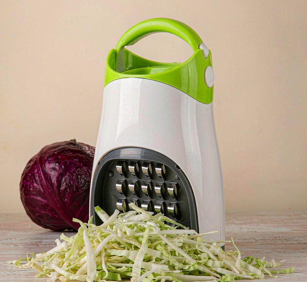 Hand-press vegetable chopper with a steel blade grid for cabbage and vegetables